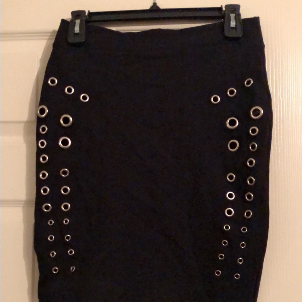 Black mini skirt with silver cutouts